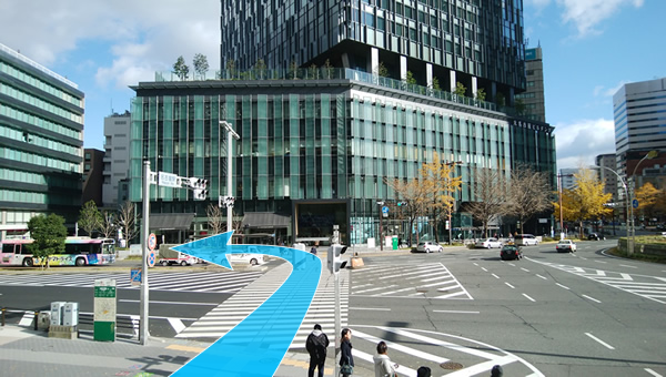 名古屋駅東口を出て、横断歩道を渡り、「大名古屋ビルヂング」を左折します。